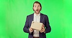 Businessman, waiting and box for online delivery on green screen in ecommerce against a studio background. Happy man checking time on watch for package, parcel or cargo and order on mockup space