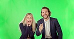 Business people, surprise and watching entertainment on green screen pointing to you against a studio background. Businessman and woman shocked or wow in good news, prize or promotion on mockup space