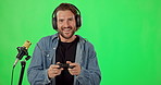 Live streaming, gaming and face of man on green screen for social media, technology and influencer. Mockup, podcast and microphone with portrait of male gamer on studio background for games vlogger