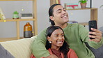 Couple, selfie and happy, bonding with love and relax on couch, interracial with trust and support in relationship. Young people at home together, smile and posing in picture for social media post