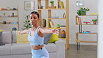 Woman, warrior and stretching for yoga in home with breathing technique, balance and flexible body. Indian female person focus on exercise, fitness or energy to breathe in living room for zen workout