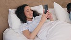 Bedroom, phone and relax couple, happy woman or girl typing, search or reading online news, social network or blog post. Home bed, happiness and person smile for mobile notification, message or text