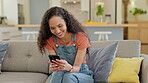 Phone, funny and woman on sofa for online communication. internet meme and social media in home living room. Happy, laugh and african person on mobile for web chat, news or networking in apartment