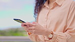 Hands, typing and smartphone with woman and chat, social media and connection while outdoor. Communication, text message or email with contact, female person writing and mobile app with closeup