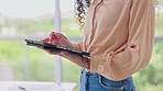 Digital tablet, hand and closeup of scrolling on social media, mobile app or the internet. Technology, networking and woman browsing for a blog online with a device for research in her modern office.