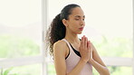 Yoga, prayer hands and meditation of woman in home for mindfulness, exercise or training. Pilates, fitness and person with namaste for zen, chakra and wellness to workout for health, calm and peace.