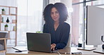 Technology, businesswoman typing on laptop and happy at her desk in a modern workplace office, Connectivity or social networking, online communication and woman writing an email with a smile