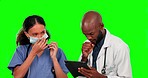 Tablet, covid mask and a doctor with a nurse on a green screen background in studio for healthcare. Medical, research and technology with a male medicine professional coughing on chromakey mockup