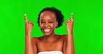 Green screen, face and black woman with beauty, pointing up and skincare on a studio background. Portrait, female person and model with hand gesture, dermatology and cosmetics with facial and makeup