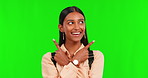Green screen, happy girl or student pointing to choice for school scholarship or university on mockup. Face portrait, two or pupil with smile showing college education, option or info on studio space