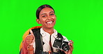 Happy woman, photographer and thumbs up on green screen for success against a studio background. Portrait of female person with smile, like emoji or yes sign and camera in photography on mockup space