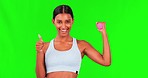Fitness, green screen and woman with thumbs up in portrait, flexing arm with dumbbell and smile. Agreement, winning and happy girl with success in sports, training and emoji for healthy exercise goal