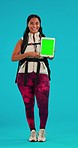 Hike, green screen and woman face with digital tablet in studio for location, search or GPS on blue background. Backpacker, travel and female portrait with online screen display for map or navigation