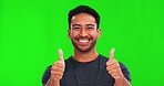 Face, thumbs up and happy man in green screen studio with hand, sign and thank you mockup background. Smile, portrait and asian male with yes finger emoji, vote or positive review, feedback or agree