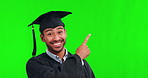 Face, pointing man and graduate on green screen in studio isolated on a background mockup. Portrait, graduation and happy Asian student with space for advertising, marketing or promo for university.