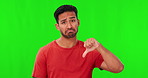 Asian man, hand and thumbs down for fail on green screen in disappointment against a studio background. Portrait of male person with no sign, wrong or negative feedback for mistake on mockup space