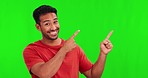 Green screen, face and man pointing to marketing space, presentation and announcement or information, Yes, advice and happy asian person show mockup, creative design or guide on studio background