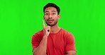 Green screen, face and man thinking in studio with questions, answer or aha expression on mockup background. Why, confused and asian guy portrait with idea, plan or solution, emoji or problem solving