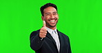Thumbs up, smile and business man on green screen for yes, thank you or support. Corporate asian person portrait in studio with like emoji hand sign for review, feedback or agreement and motivation