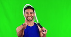 Asian man, tennis and thumbs up on green screen for approval or success against a studio background. Portrait of male person or sports player with smile, racket and like emoji or yes sign on mockup