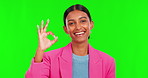 Okay, smile and face of woman on green screen for support, motivation and agreement. Success, winner and vote with portrait of person on studio background for feedback, thank you and yes emoji