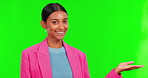 Presentation, product or checklist with a woman on green screen background in studio for advertising. Portrait, marketing and palm of a young female brand ambassador showing instructions on chromakey