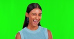 Green screen, happy woman and face wink for flirting, romance and emoji in studio. Portrait, young indian female model and smile of blink, secret and fun personality of girl in good mood on chromakey