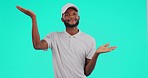 Choice, hands and portrait of black man in studio confused with decision against blue background space. Palm, scale and face of African male with dont know gesture, emoji or sign, option or questions