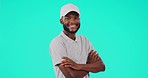 Black man, arms crossed and portrait with a smile in sport coach clothing in a studio. Young male person, African model and confidence with green background and happy with casual fashion and style