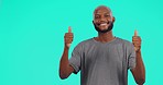 Black man, hands and thumbs up on mockup for advertising success against a studio background. Portrait of African male person show palm with like emoji, yes sign or approval for marketing on mock up