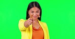 Happy, pointing and face of a woman on a green screen for recruitment, hiring and human resources. Smile, decision and portrait of a hr worker with a hand gesture isolated on a studio background
