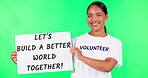 Woman, volunteering sign and green screen with face, smile and recruitment for charity drive in mockup. Girl, student or young activist with poster, billboard and paper for accountability in studio