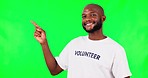 Face, black man and volunteer pointing, green screen and support with ngo, opportunity and decision. Portrait, male person and humanitarian with hand gesture, choice and mockup space with development