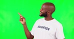 Face, black man or volunteer pointing, green screen or thinking against a studio background. Portrait, male person or model with promotion, idea or mockup space with questions, opportunity or charity