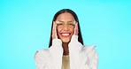 Blue background, stylish and face of a woman with glasses for vision, eyewear and eye care. Happy, trendy and portrait of a young girl with confidence in specs isolated on a studio background