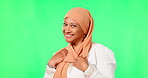 Fashion, muslim and scarf with a woman on a green screen background in studio for islamic faith or style. Portrait, smile and funny with a happy arab female posing on chromakey mockup for religion