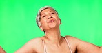 Happy, green screen and woman blowing a kiss for love, care and flirting face expression. Happiness, smile and beautiful mature female model with a kissing gesture isolated by chroma key background.