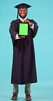 University, graduation and green screen on a tablet with a student black man in studio on a blue background. Portrait, application and chromakey on an empty display with a male university graduate