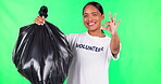 Cleaning, OK and volunteer or woman on green screen of trash, pollution and climate change support or waste goals. Face, yes sign and NGO person, plastic bag and tracking markers on studio background