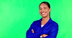 Smile, arms crossed and a woman mechanic on a green screen background n studio for marketing. Portrait, service and expert with a happy female engineer or technician standing on chromakey mockup