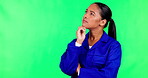 Woman, green screen and construction worker thinking of idea for building, project management or problem solving. Industrial, decision and employee in warehouse, factory and ideas for maintenance