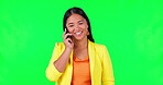 Green screen, phone call and Asian business woman talking in a mobile conversation as communication or networking. Happy, professional and young employee listening to internet audio message online