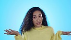 Choice, hands and face of woman in studio confused with questions and body language on blue background. Doubt, portrait and female person with choice, opinion or decision, unsure and emoji expression