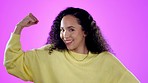 Flexing, happy and face of a woman in a studio for empowerment, success or achievement. Winning, strong and portrait of a young female model, winner or champion with arm strength by purple background