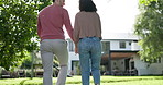 Real estate, excited and couple walking to a new home or rental property and happy together for a house. Bonding, love and back view of people or man and woman ready for apartment loan or mortgage