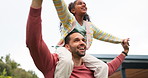 Happy, piggyback and playful with father and daughter in outdoors for bonding, smile and freedom. Family, happiness and game with man carrying young girl on shoulders for relax, support and love