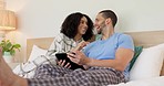 Couple, tablet and laughing in bed, morning and bond with funny video, movie or meme for love, care or hug. Man, woman and digital touchscreen for typing, comic social network or online game in house