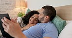 Couple, tablet and relax on bed, home and morning with video, movie and kiss with love, care and hug. Man, woman and digital touchscreen with typing, social network app and bonding together in house