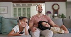 Happy family, bond and watching tv on sofa laughing, relax and chilling in their home on the weekend. Television, entertainment and parents with girl kid in living room with love, smile or streaming