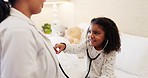 Girl, doctor and hospital with woman, stethoscope and playing on bed for healthcare, wellness and smile. Female medic, kid patient and medical tech for game, happy or clinic with care in consultation